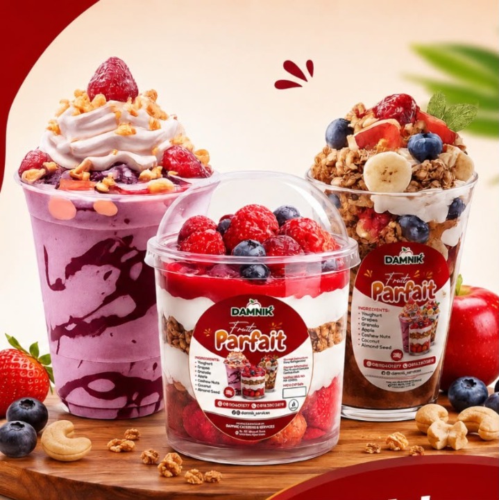 Fresh fruit yoghurt parfaits layered with granola on a modern platter.