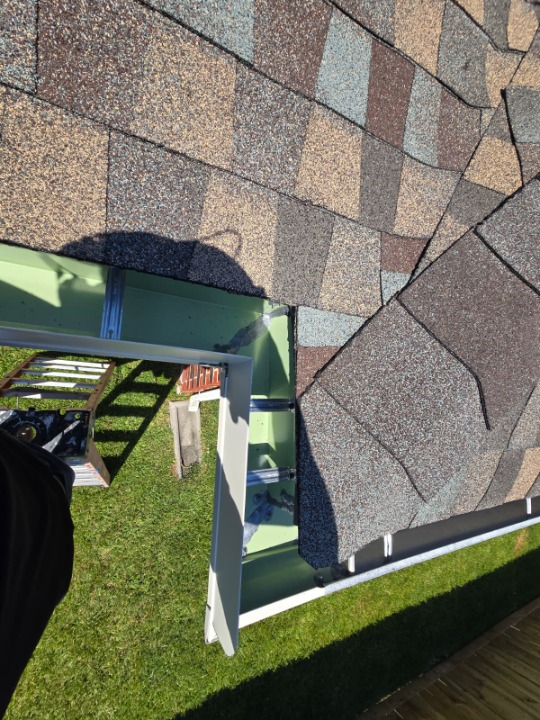 Wood privacy fence installation in a backyard